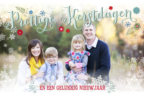 Foto kerstkaart met typografie in groen en sneeuw
