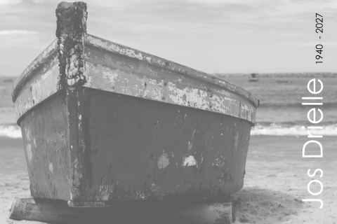 Rouwkaart met foto van een bootje