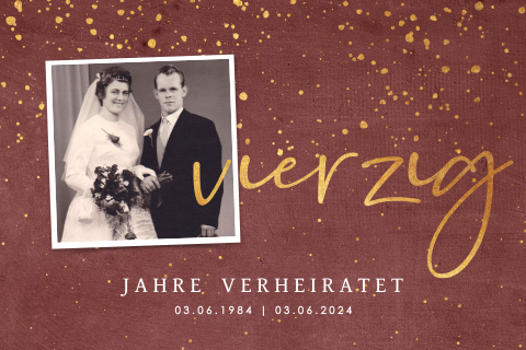 Einladung zur Rubinhochzeit mit Konfetti auf dunkelrotem Hintergrund