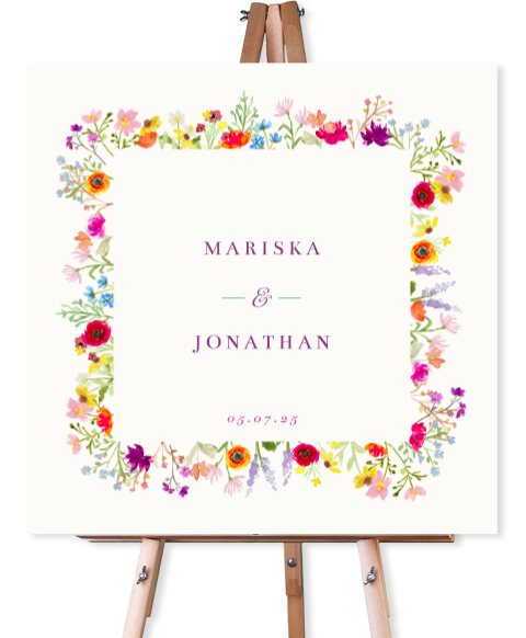 Vrolijk welkomstbord voor jullie bruiloft met kleurrijke veldbloemen
