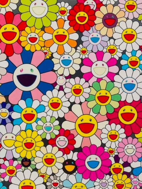 Bovenaanzicht van kleurrijk boeket bloemen tegen felgele achtergrond.